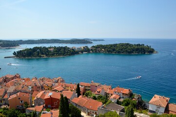 Naklejka na ściany i meble panoramic view of Rovinj Croatia old town with blue sea and Red island 