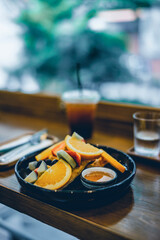 frurit salad with coffee cup in the cafe