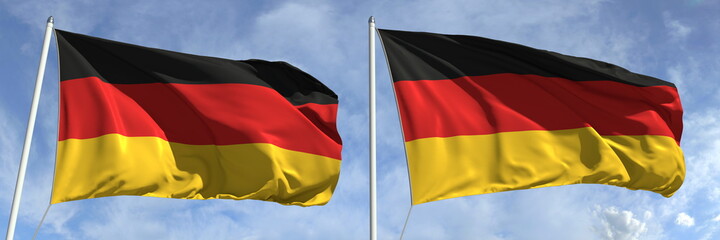 Flying flags of Germany on sky background, 3d rendering