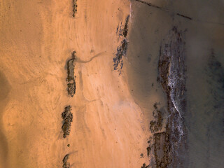 Beach rocks from above at low tide