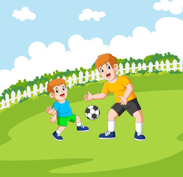 Two boys are playing the football
