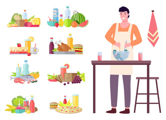 Man cooking salad in the kitchen. Set of products, dietary food compositions. Household activity, everyday duties and chores. Man in a kitchen apron stands near the table and prevents salad in a bowl