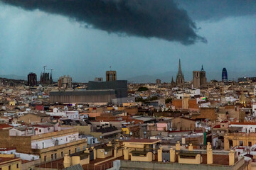 Barcelona, Catalonia, Europe, Spain, September 22, 2019. Top panoramic view of the Barcelona landscape on sunset. Historical buildings in the background.
