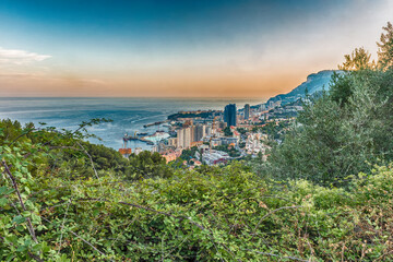 Panoramic view of Monaco at sunset from the Grande Corniche