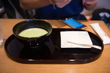 Fototapeta na wymiar Organic Green Matcha Tea in a Bowl