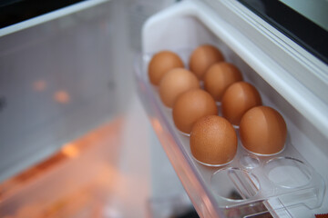 Eggs in refrigerated containers (ingredients for cooking and snacks)