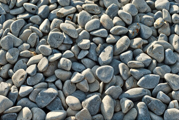 Drainage systems from small pebbles. Garden drainage for plants and trees. Gray stones for roads and flower beds.