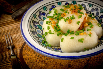 Potato dumplings stuffed with minced meat (kartacze).