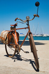 A bike ready for adventure and ride on the beach of seaside resort Novigrad, Cittanova on Adriatic...