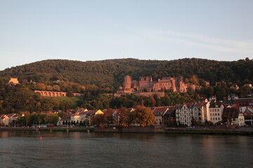 View of Heidelberg old town and Castle with the river Neckar during sunset in autumn in Heidelberg, Germany