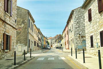 Scenic countryside road to beautiful vineyard of Istria, Croatia, on sunny day