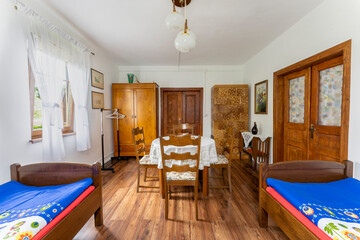 Room to let with old style furniture in Kalwaria Pacławska, Poland
