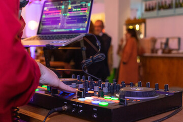 deejay playing at a nightlife venue during the pandemic