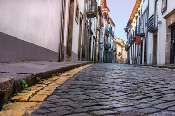 Ground Level Cobblestone Narrow European Village Street, Braga, Portugal