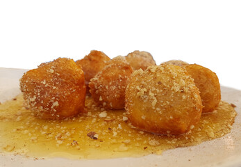 loukoumades with honey and nuts greek turkish traditional food sweet