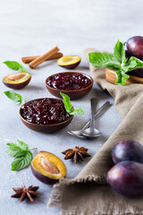 Plum jam and ingredients for its preparation. Homemade marmalade for a delicious Breakfast