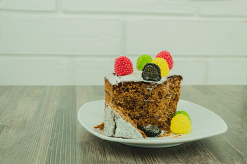 A slice of cake in the process of eating