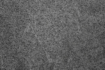 black and white structured texture of a grey grungy wall