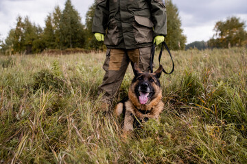 A police officer with a service dog