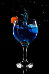 crystal glasses with splashing drink