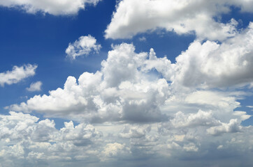 beautiful dramatic blue sky and white fluffy cloud horizon outdoor for background.
