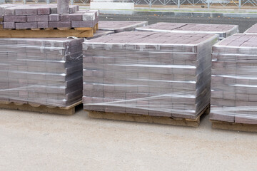 New paving slabs laid out in briquettes for the improvement of pedestrian urban areas.