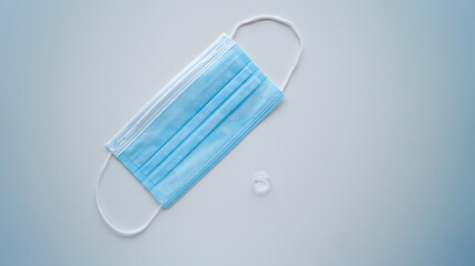 a mask and a drop of sanitizer.