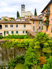 Fototapeta na wymiar View of narrow street in old town of Barga a medieval hilltop town in Tuscany, Garfagnana, Italy, Europe