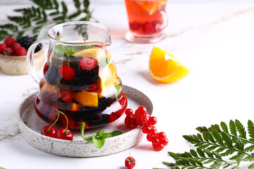 fruit berry tea in a glass teapot