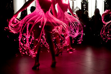 Glowing red dress at the carnival