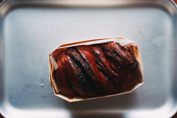 French homemade sweet brioche bun with chocolate delicious food