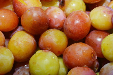 the texture of ripe plum in bulk, early fruits fruits