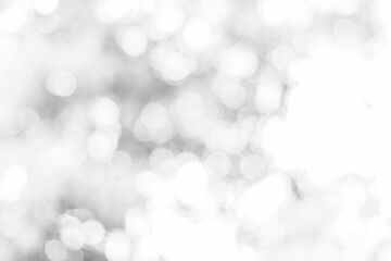 Abstract blurred silver bokeh soft light background and texture. Christmas and Happy new year on...