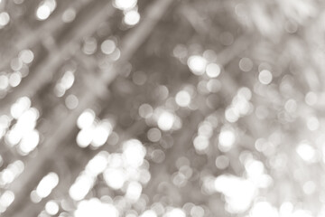 Abstract blurred silver bokeh soft light background and texture. Christmas and Happy new year on blurred bokeh with snowfall banner background.