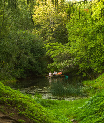 Boat trip: two people on a canal