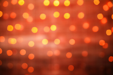 Christmas lights garland out of focus. Yellow and red Christmas lights.