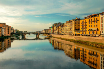 Obraz premium A view from above of the bridges of the Arno River in Florence. The ancient bridge of Ponte Vecchio