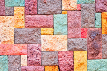 Colorful concrete blocks in an abstract patchowork .