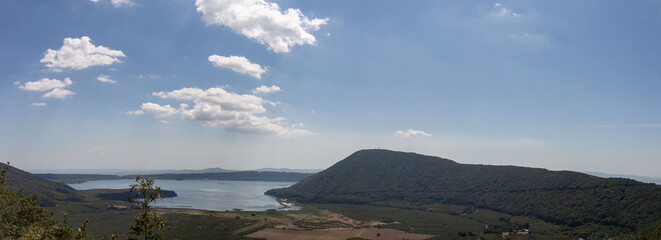 Obraz premium Panorama of Lake Vico.Is a caldera lake in the northern Lazio region,central Italy.And one of the highest major Italian lakes, with an altitude of 510 m.Photography from View point of the Cimini Hills