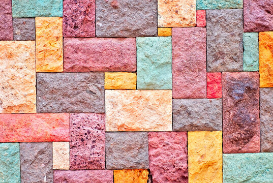 Colorful concrete blocks in an abstract patchowork .