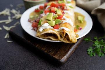 Honey lime chicken enchiladas with toppings