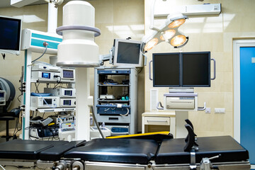 Medical devices, Interior hospital design concept. Interior of operating room in modern clinic, screen with tests closeup