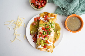 Honey lime chicken enchiladas with toppings
