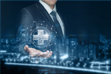 Businessman shows a plus sign .