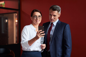 Waist up portrait of advisor and his assistant