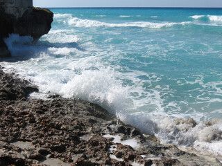 waves crashing on rocks