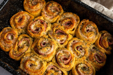 Ham and Swiss roll-ups pinwheels, Puff pastry rolls with ham and cheese 