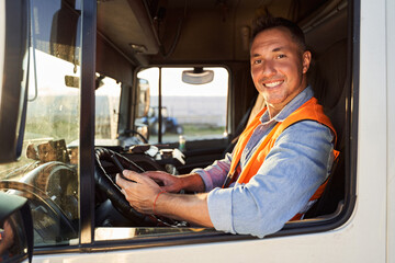 Smiling truck driver in cap