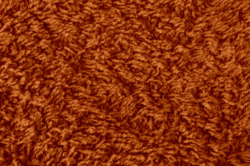Extreme close up of the texture of a brown towel background