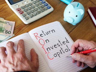 Return on Invested Capital ROIC is shown on the conceptual business photo
